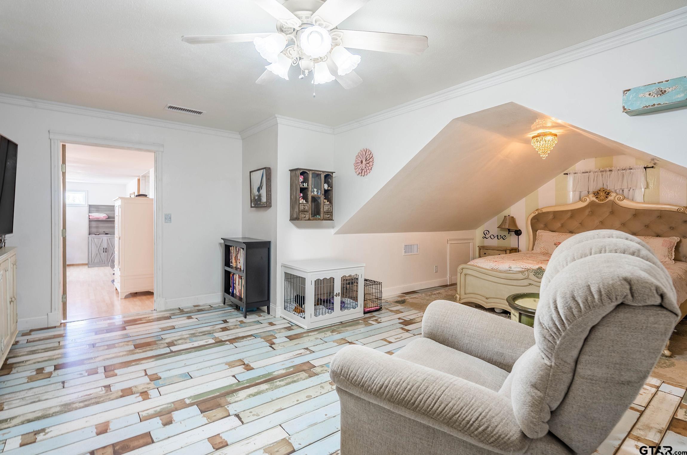 6523 North Sparta Avenue Odessa, TX 79764 - Photo 10 of 38 a living room with furniture and a chandelier