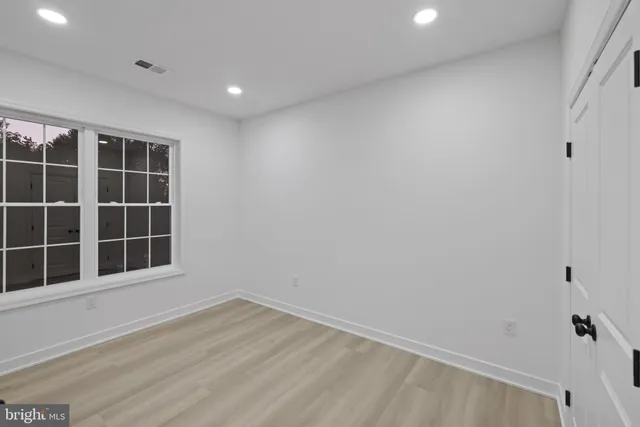 a bathroom with a sink double vanity and a shower