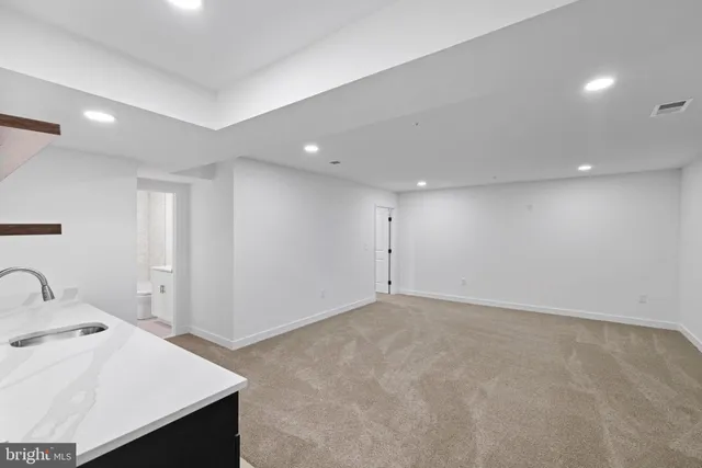 a view of a room with an empty space