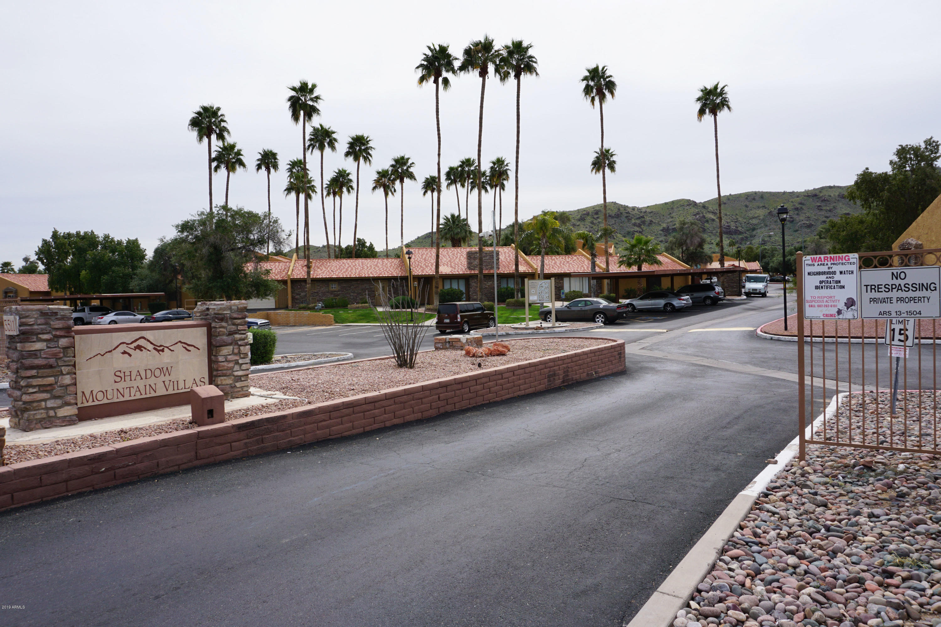 3511 East Baseline Road, Unit 1194 Phoenix, AZ 85042 - Photo 1 of 12 a view of a street with tall buildings