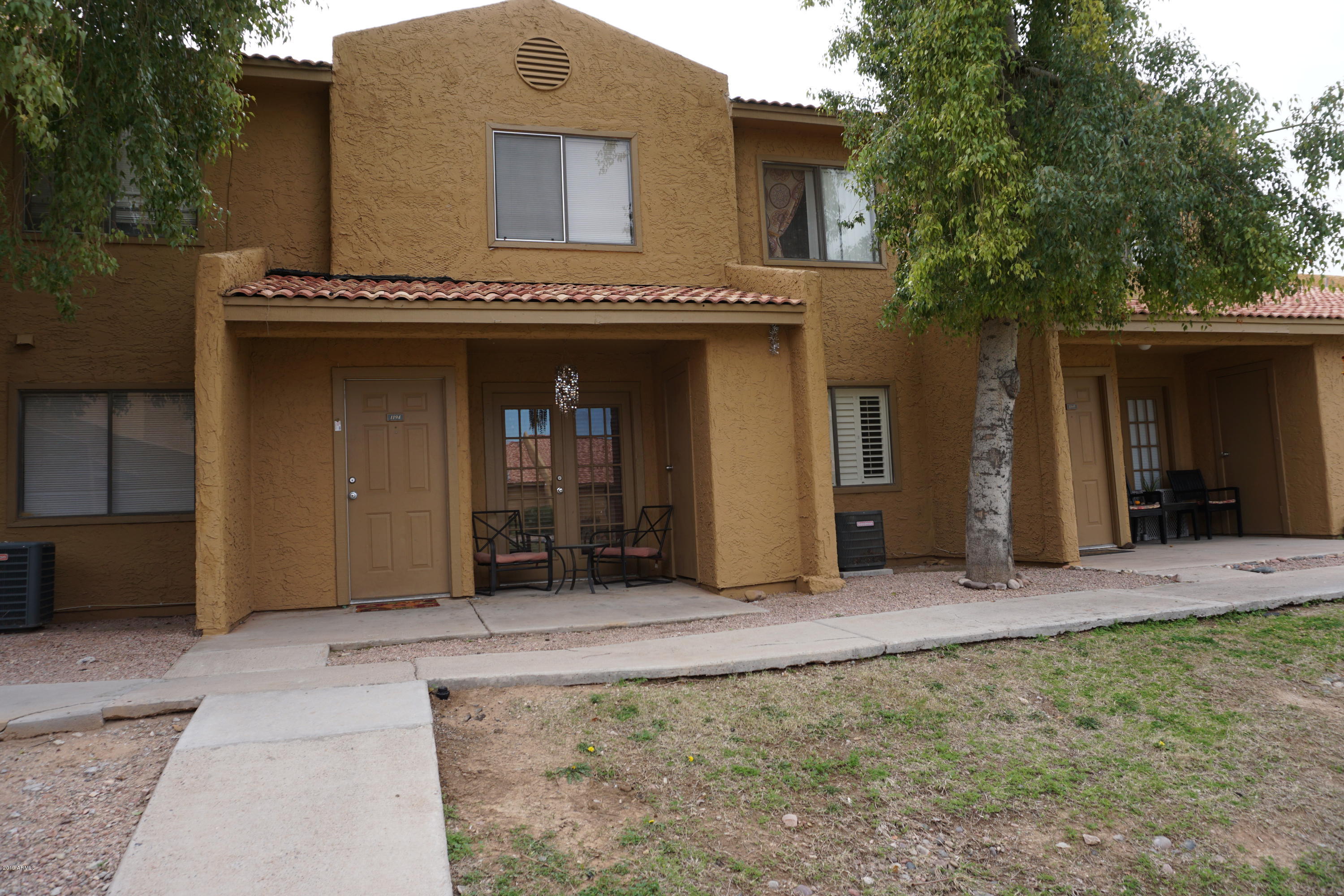 3511 East Baseline Road, Unit 1194 Phoenix, AZ 85042 - Photo 12 of 12 a view of a house with a porch
