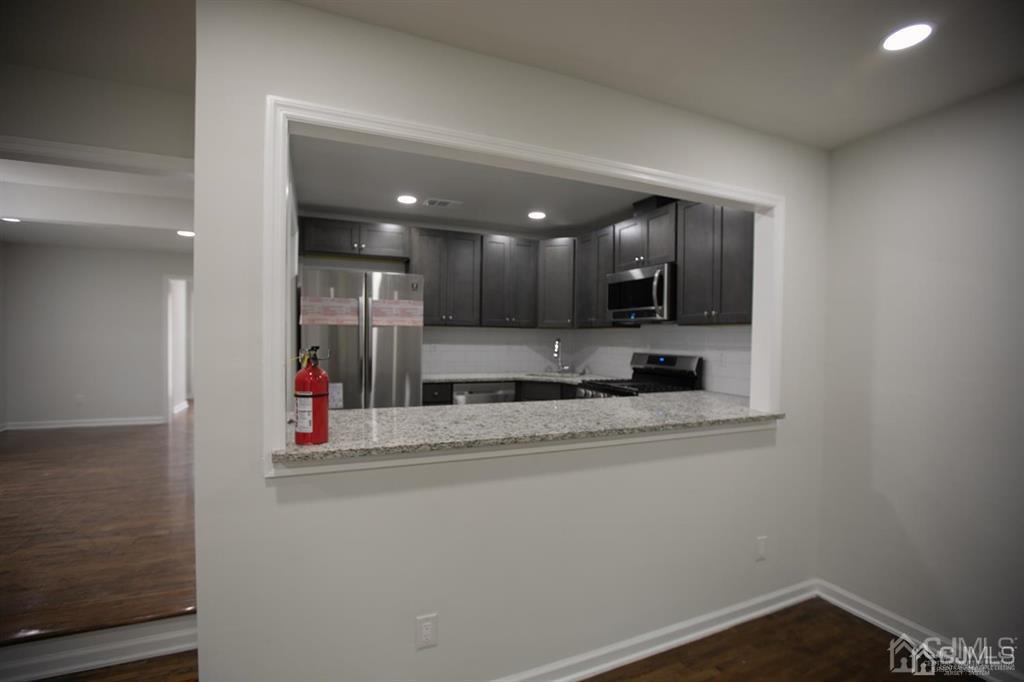 4208 Hana Road Edison, NJ 08817 - Photo 17 of 34 a view of a kitchen with a sink and dishwasher