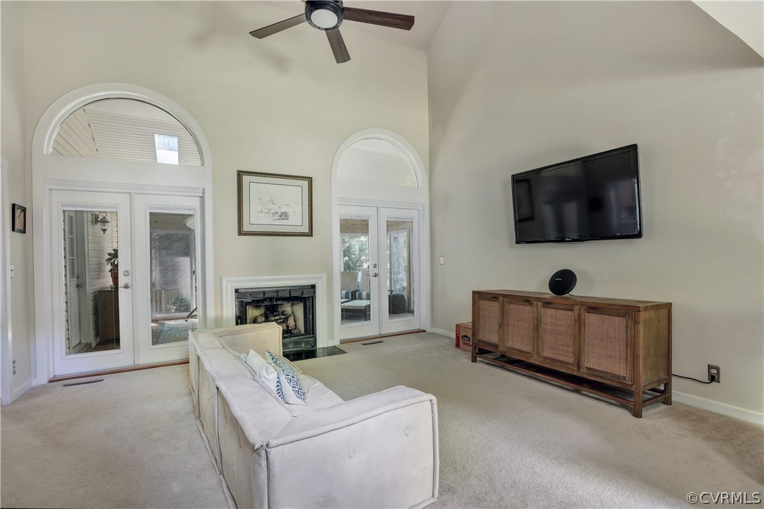 5612 Woods Walk Road Midlothian, VA 23112 - Photo 19 of 26 a living room with furniture and a flat screen tv