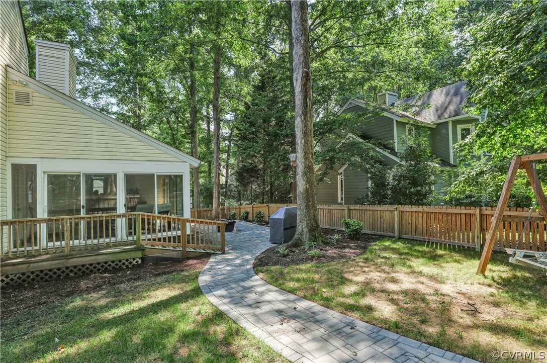 5612 Woods Walk Road Midlothian, VA 23112 - Photo 25 of 26 a view of a house with backyard and a tree