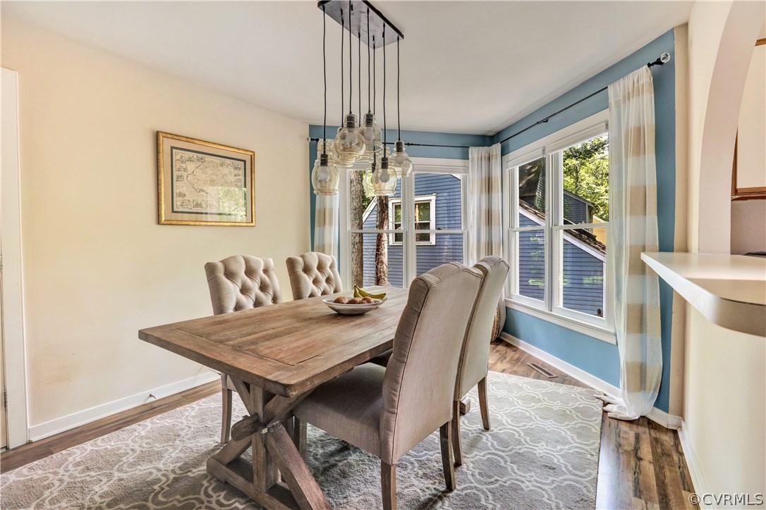 5612 Woods Walk Road Midlothian, VA 23112 - Photo 5 of 26 a view of a dining room with furniture window and outside view