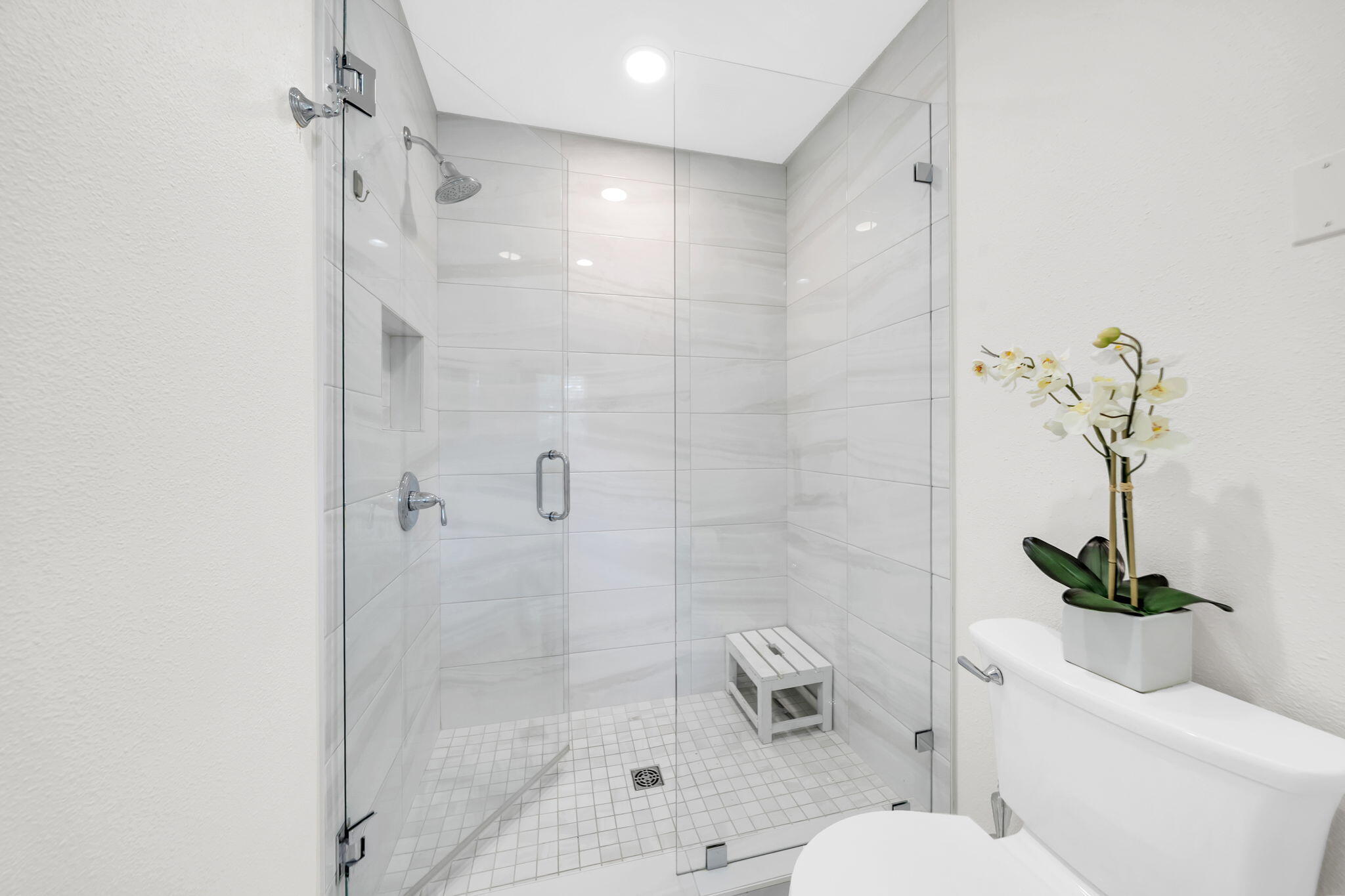 159 Golden Eagle Court, Unit 3C Santa Rosa Beach, FL 32459 - Photo 26 of 34 a bathroom with a shower a toilet and a shower