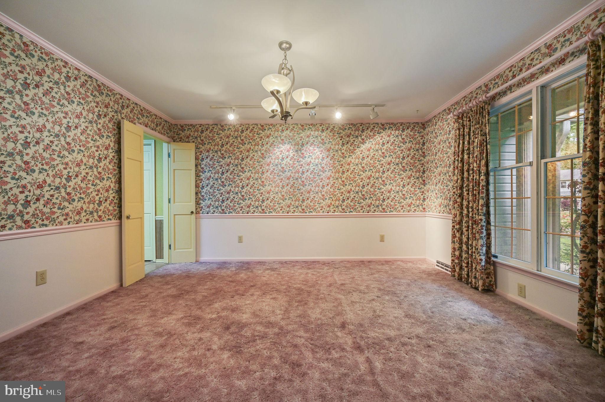 235 Carnoustie Road Dover, DE 19904 - Photo 13 of 30 wooden floor in an empty room with a window