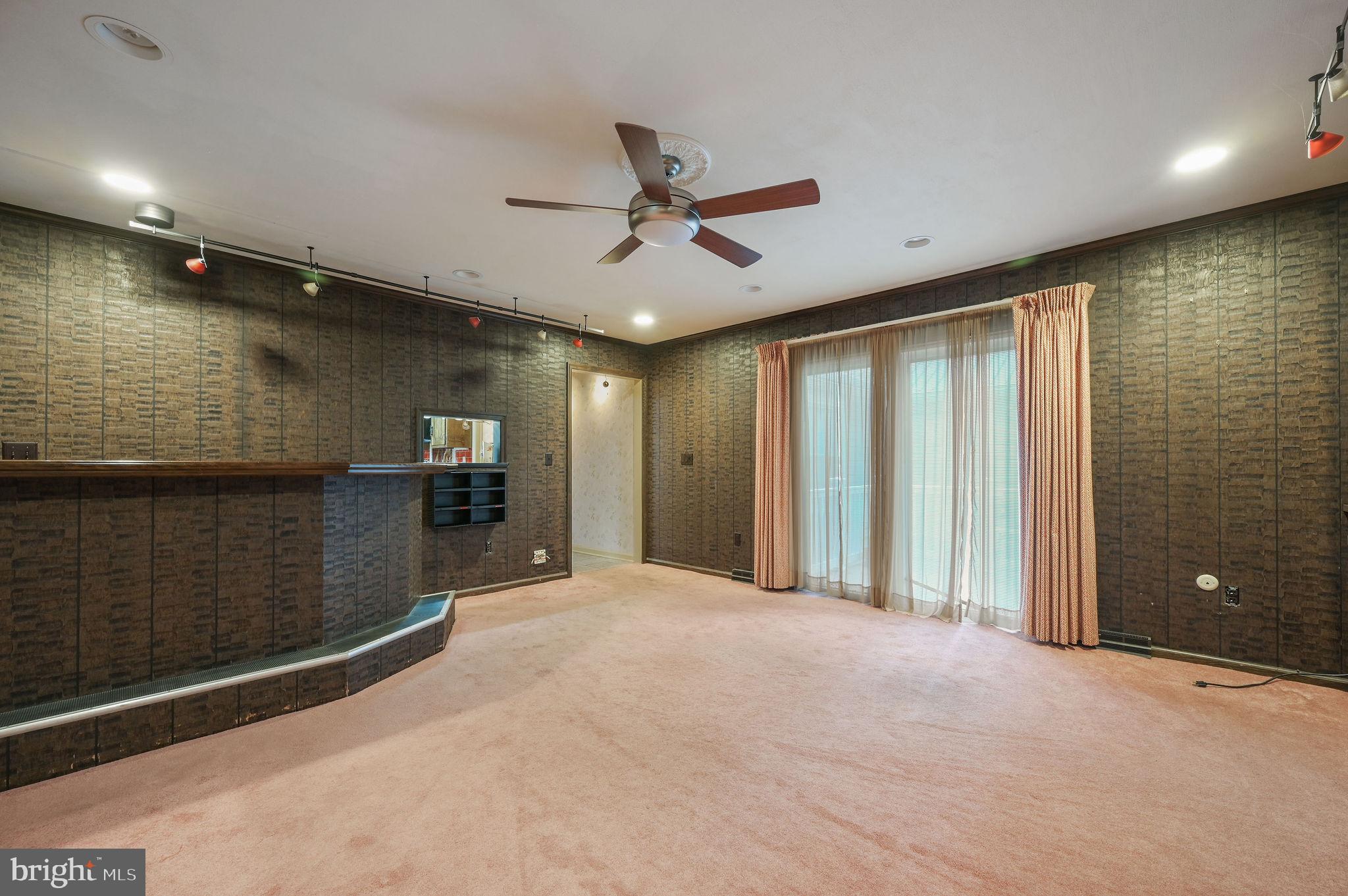 235 Carnoustie Road Dover, DE 19904 - Photo 23 of 30 a view of a livingroom with a projector and furniture