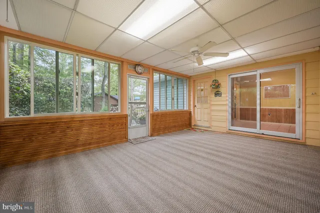 a utility room with cabinets dryer and washer
