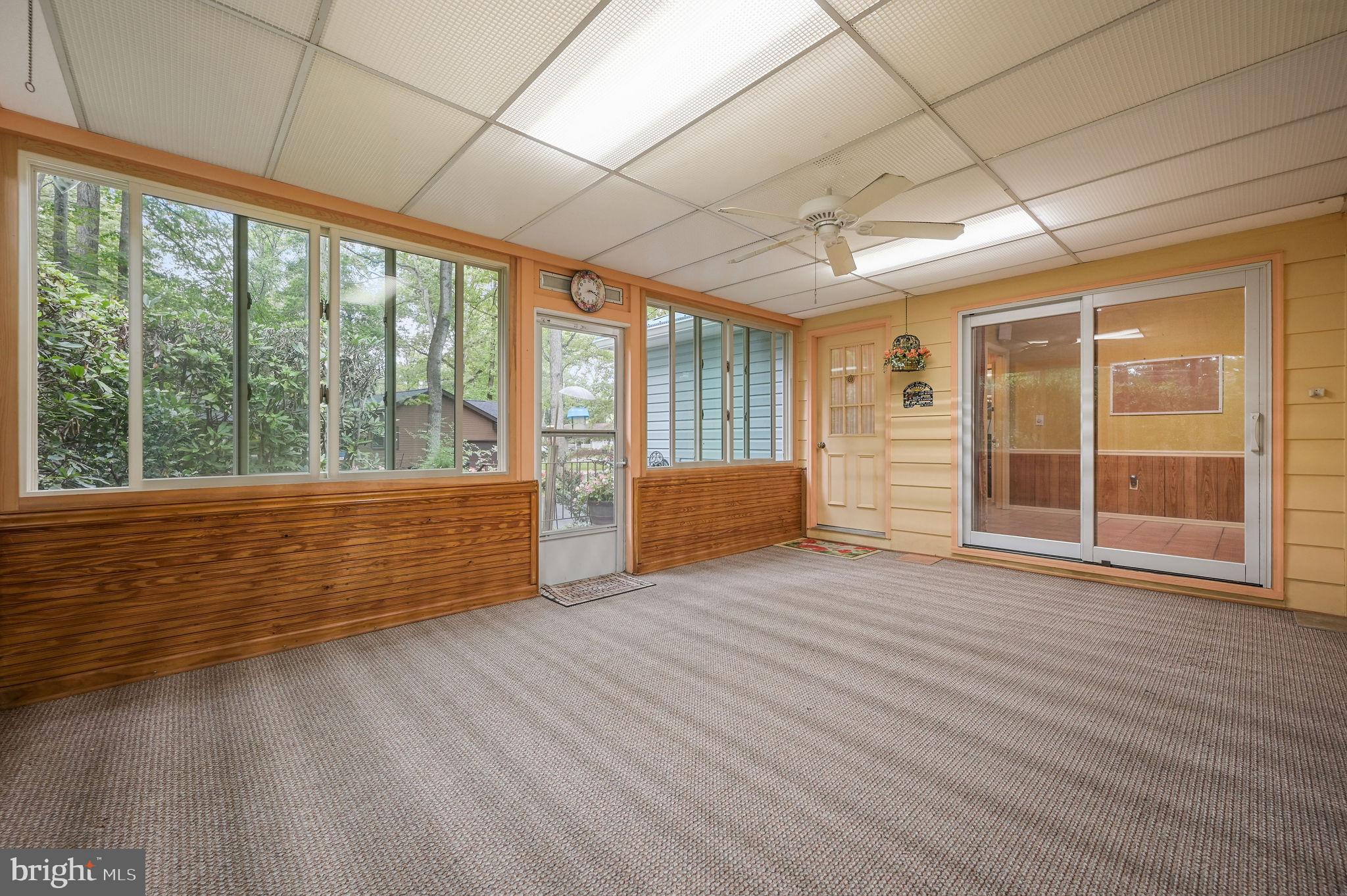 235 Carnoustie Road Dover, DE 19904 - Photo 7 of 30 a view of an empty room with a window