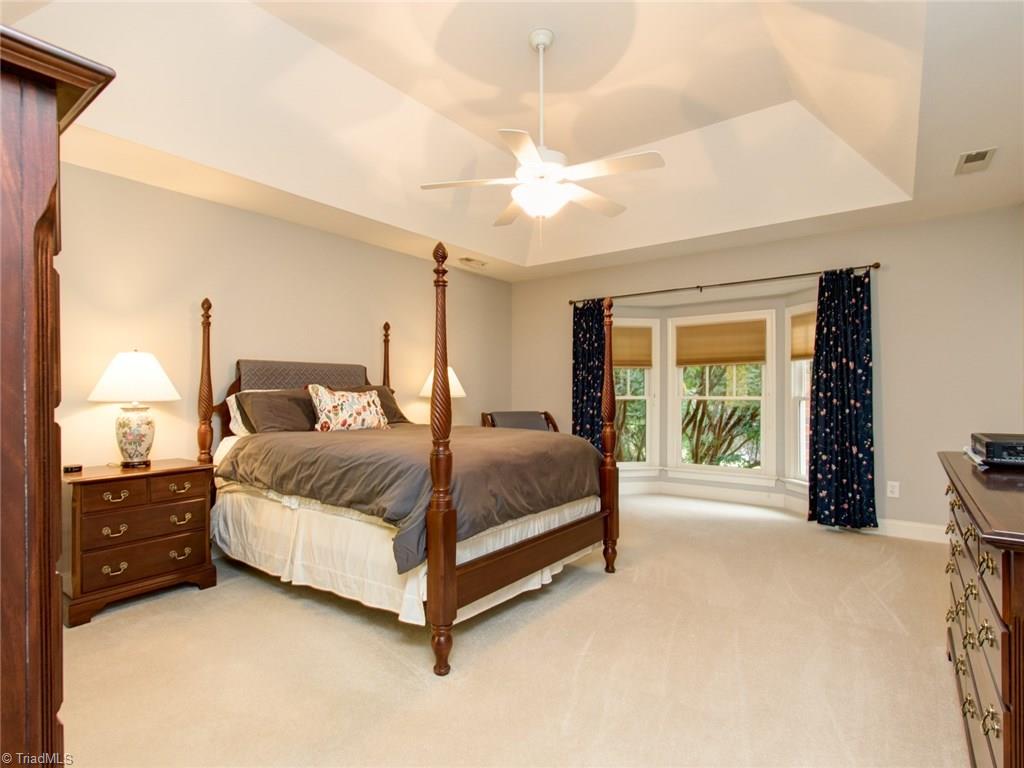 6001 Dunvagen Court Oak Ridge, NC 27310 - Photo 18 of 30 Master Suite features tray ceiling and bay window...