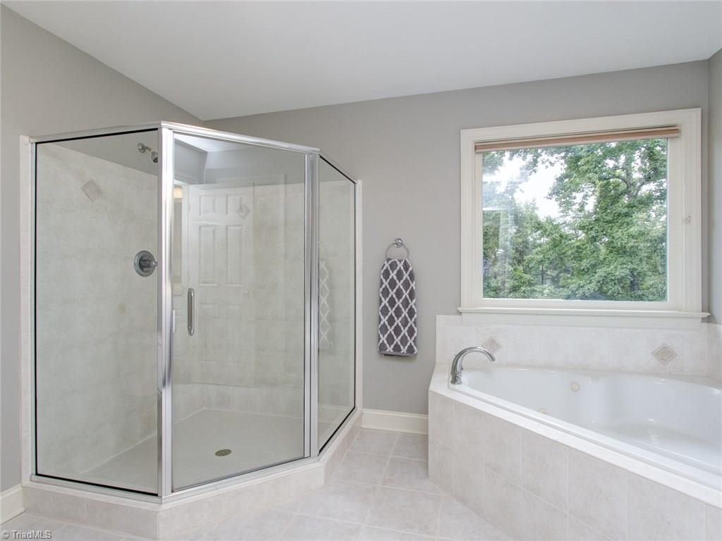 6001 Dunvagen Court Oak Ridge, NC 27310 - Photo 20 of 30 Corner jetted tub in Master Bath