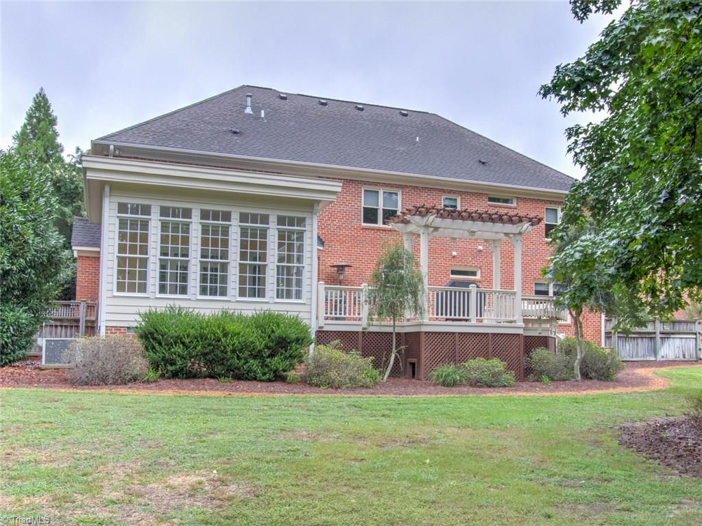 6001 Dunvagen Court Oak Ridge, NC 27310 - Photo 29 of 30 Back exterior view of this beautiful home!
