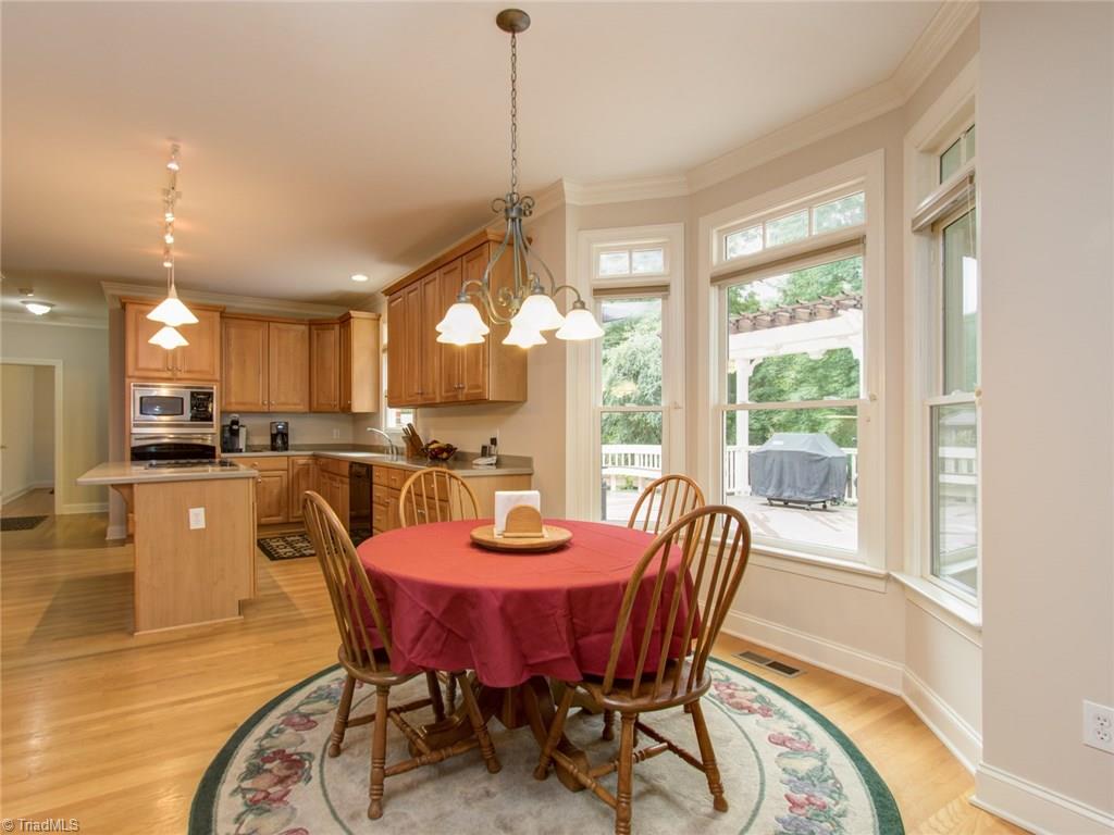 6001 Dunvagen Court Oak Ridge, NC 27310 - Photo 6 of 30 Breakfast Room overlooks private back yard...