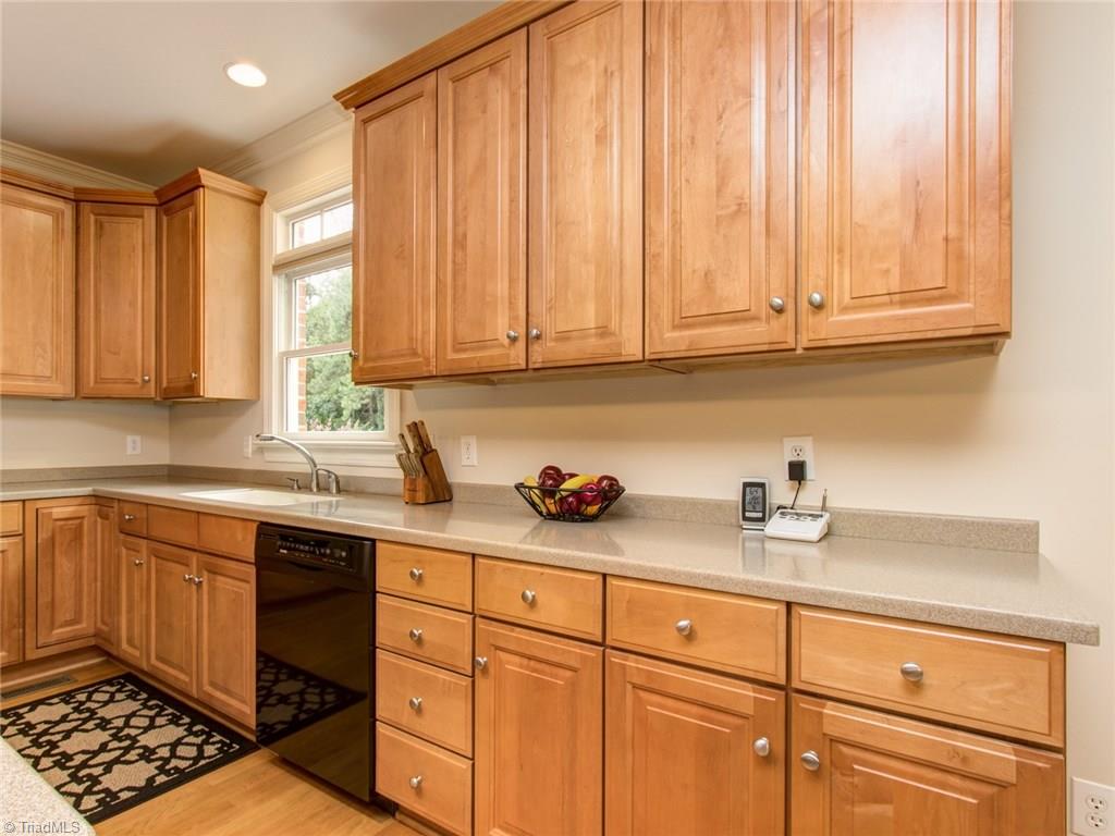 6001 Dunvagen Court Oak Ridge, NC 27310 - Photo 8 of 30 Lots of cabinet and countertop space in this large Kitchen!