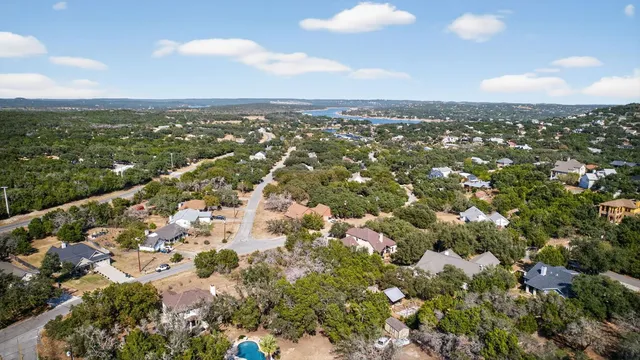 an aerial view of residential building with parking space