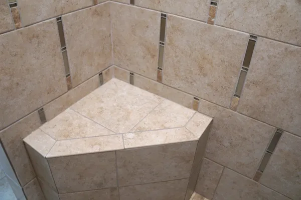 a en suite bathroom with a sink and a mirror