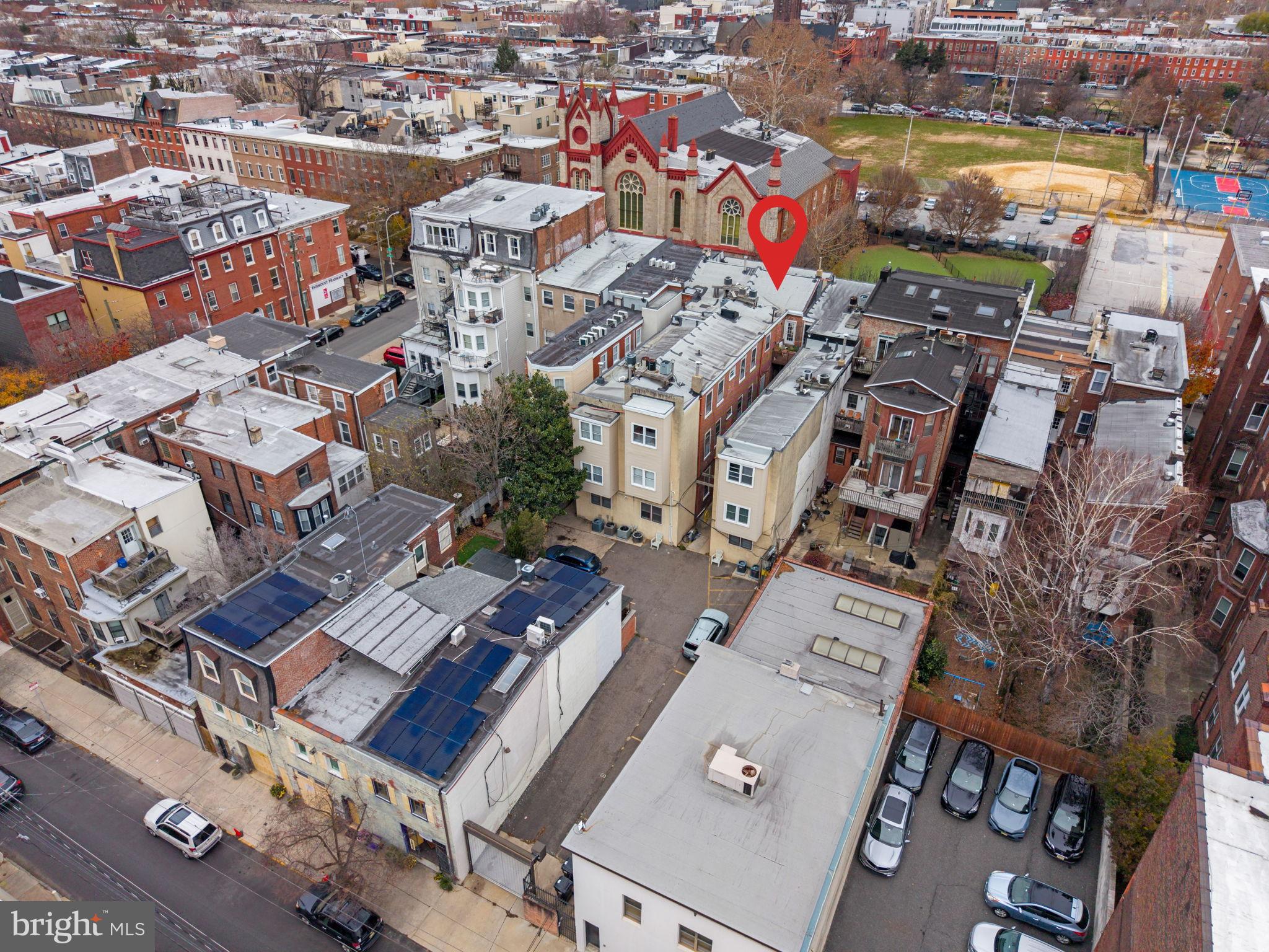 1828-00 Green Street, Unit 1R Philadelphia, PA 19130 - Photo 29 of 37 an aerial view of a city with lots of residential buildings