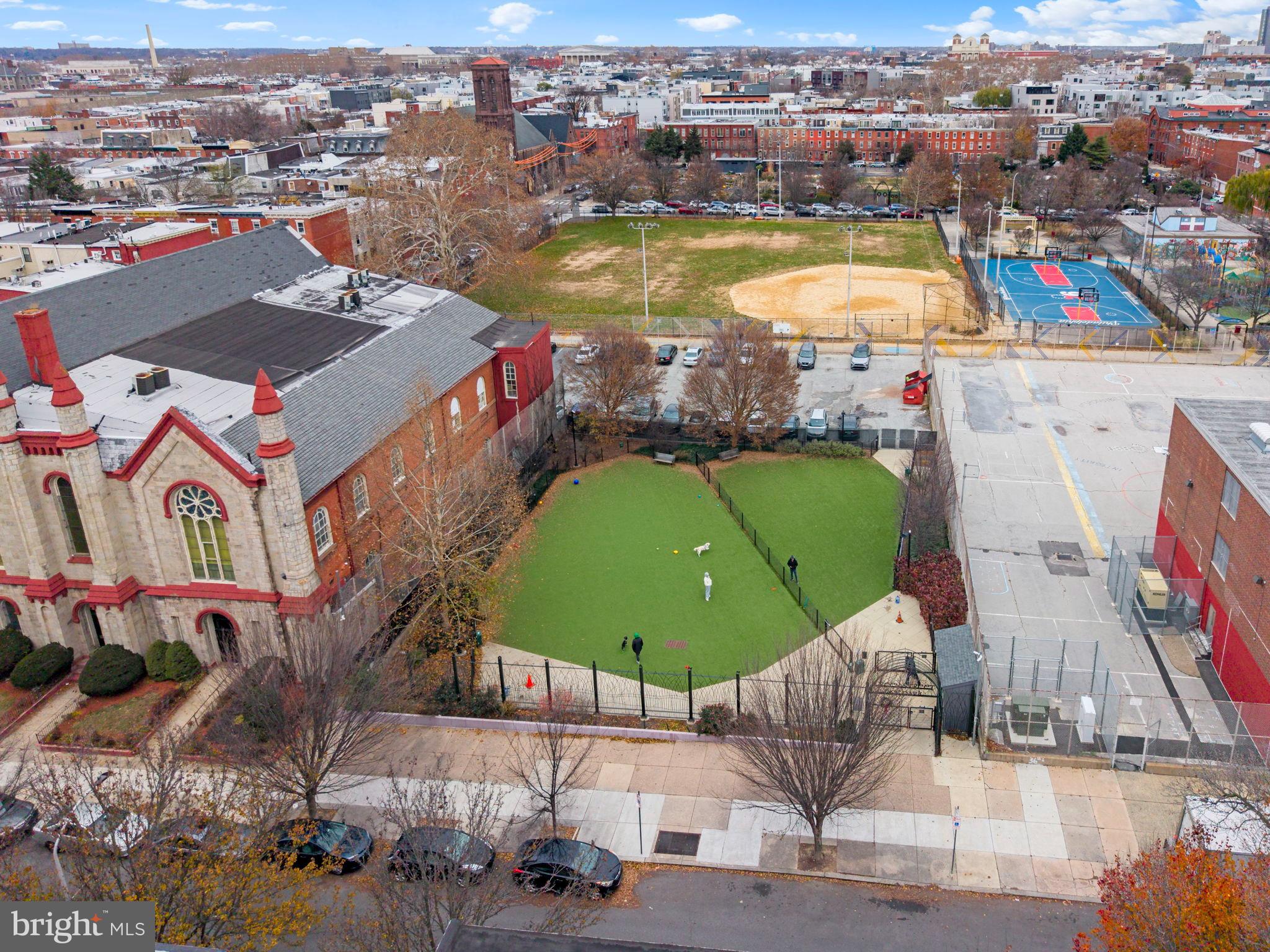 1828-00 Green Street, Unit 1R Philadelphia, PA 19130 - Photo 32 of 37 an aerial view of a house with a swimming pool yard and outdoor seating