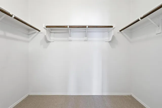 a view of a room with racks on the wall