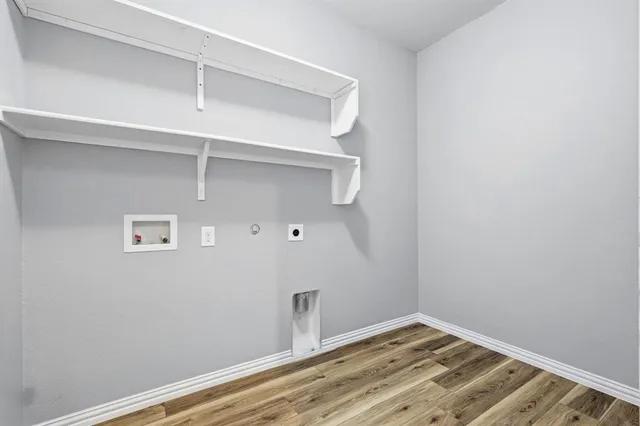 a view of small space with wooden floor