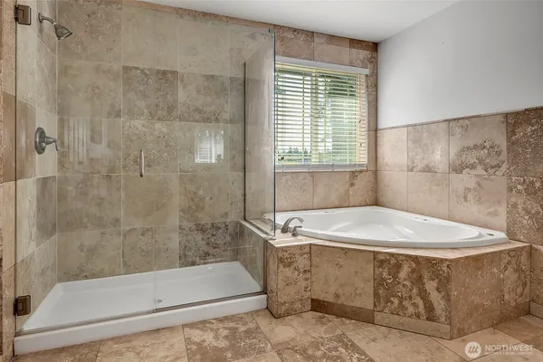 a bathroom with a bath tub