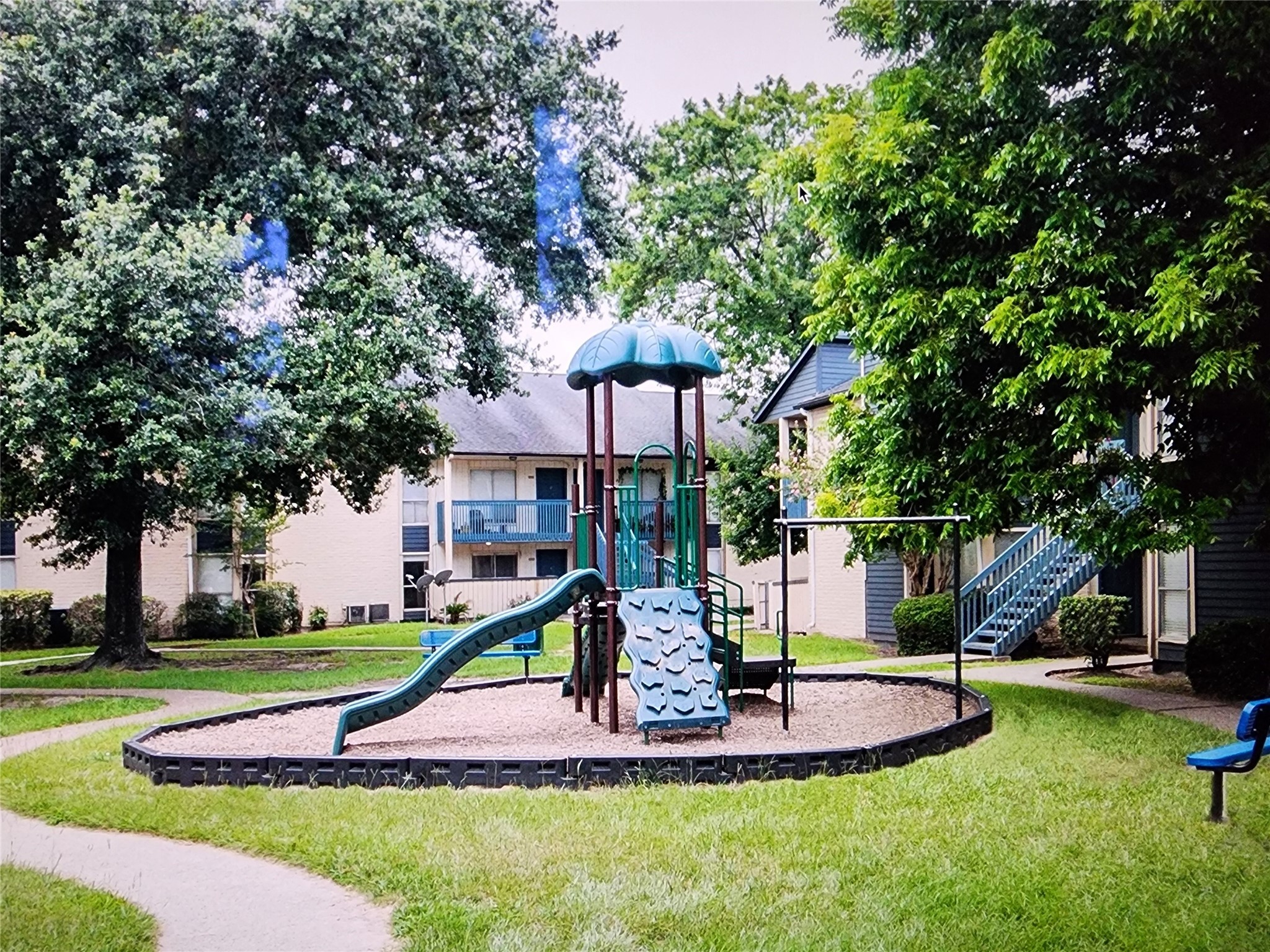 2402 Bammelwood Drive, Unit 226 Houston, TX 77014 - Photo 4 of 8 a view of a house with a yard