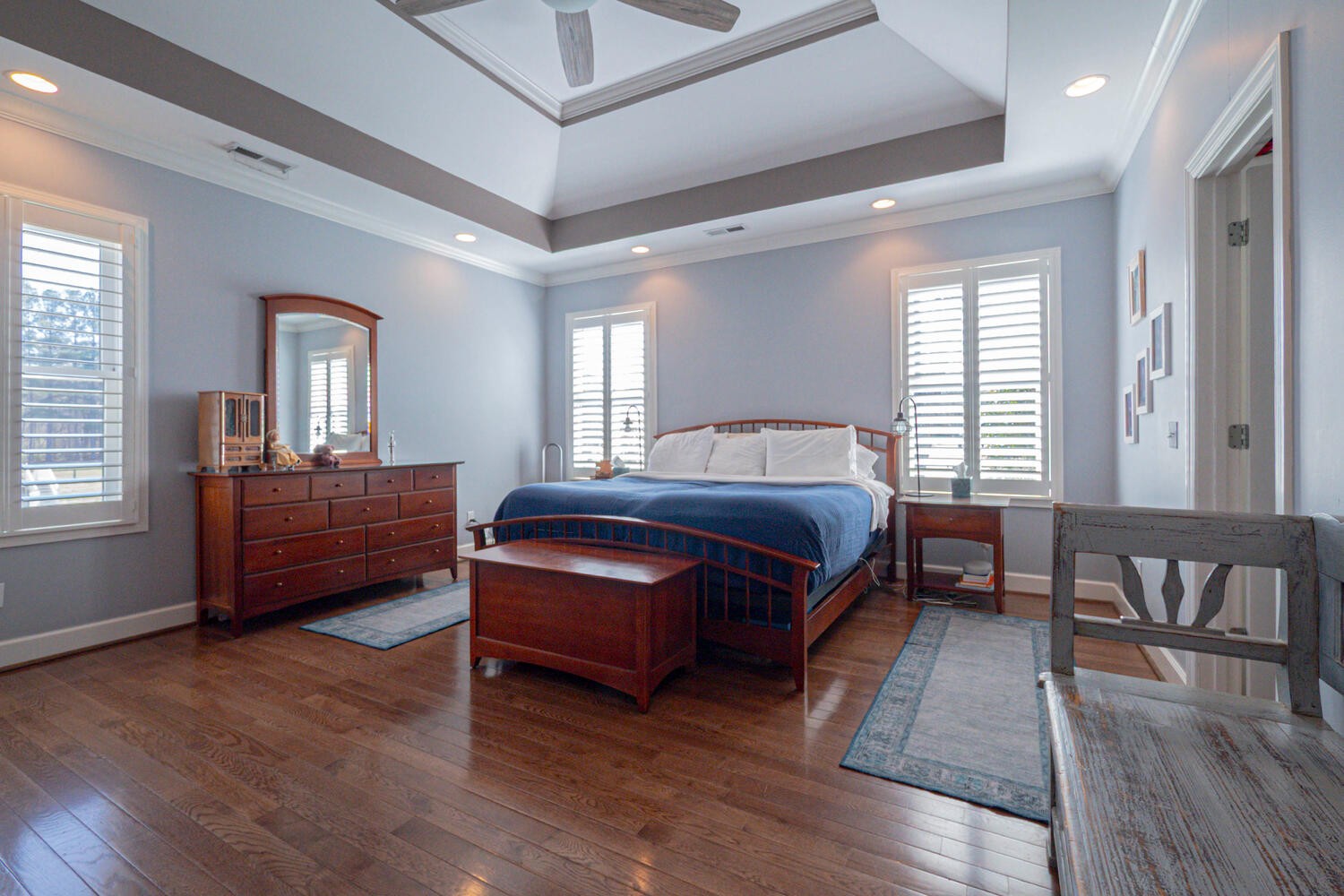 5125 Old Harding Road Franklin, TN 37064 - Photo 22 of 50 a bedroom with a bed and wooden floor
