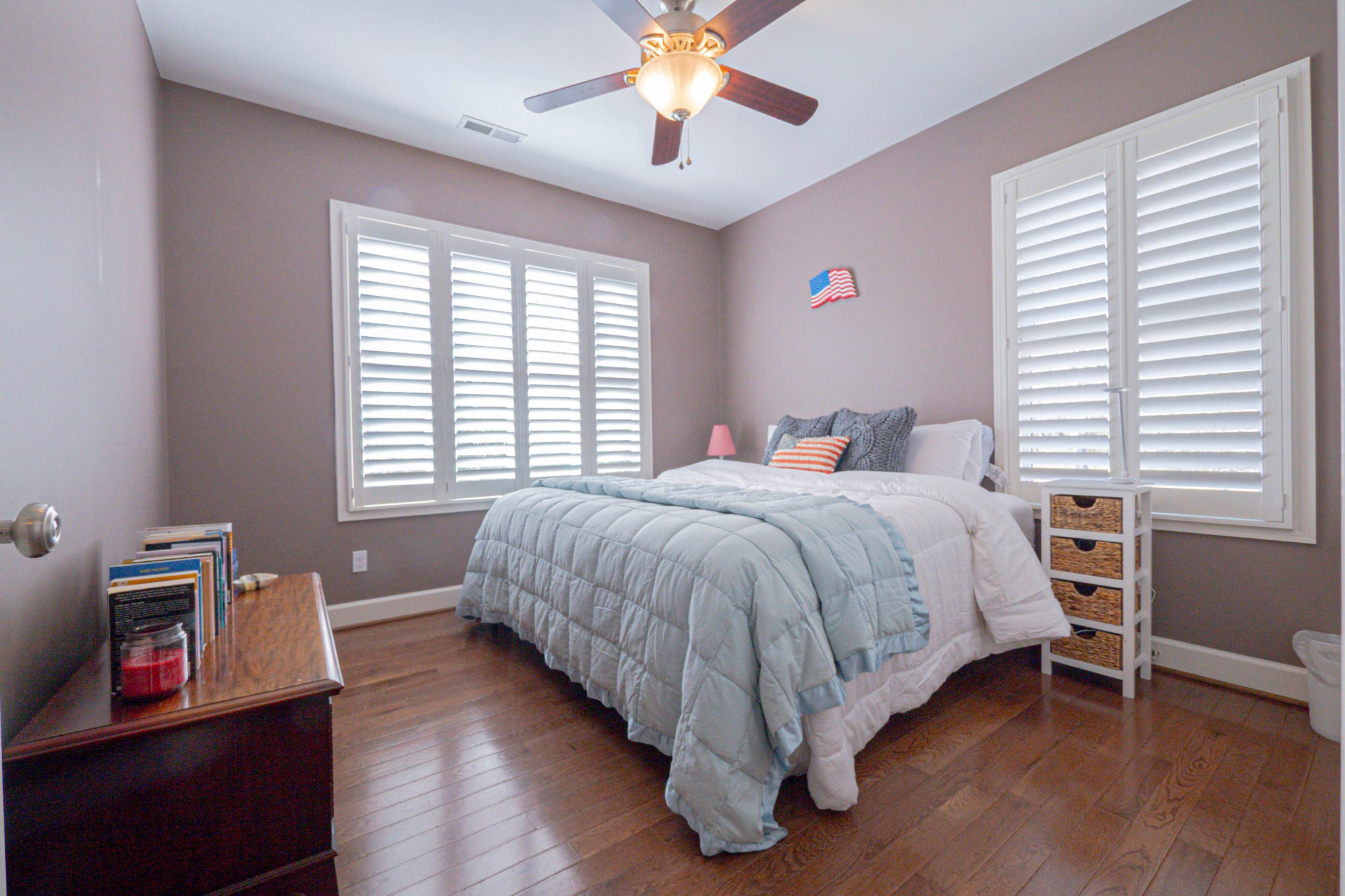 5125 Old Harding Road Franklin, TN 37064 - Photo 28 of 50 a bedroom with a bed and a chandelier