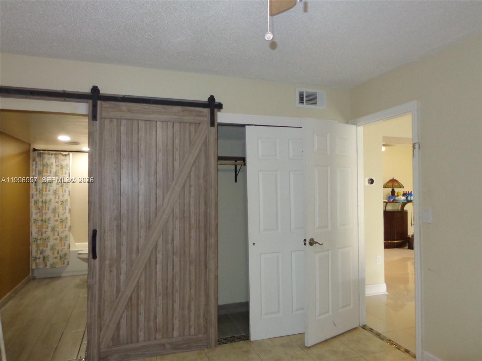 4172 Inverrary Drive, Unit 110 Lauderhill, FL 33319 - Photo 15 of 25 a view of a bathroom with shower