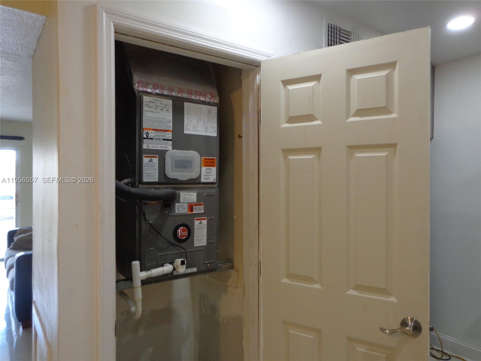 4172 Inverrary Drive, Unit 110 Lauderhill, FL 33319 - Photo 17 of 25 a picture of a bathroom with mirror