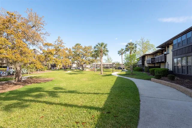 a view of swimming pool with outdoor space and seating area