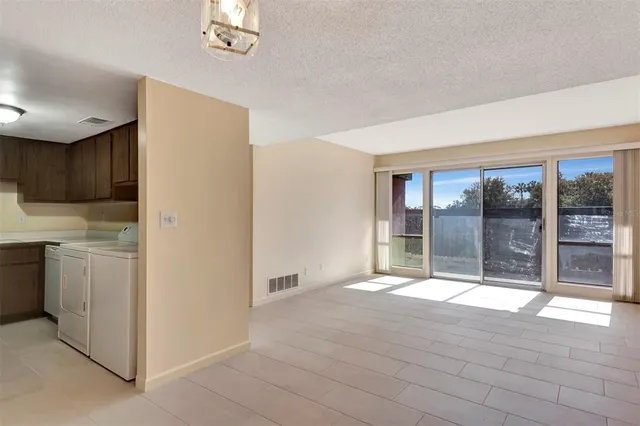 a view of a kitchen with a sink and dishwasher kitchen view
