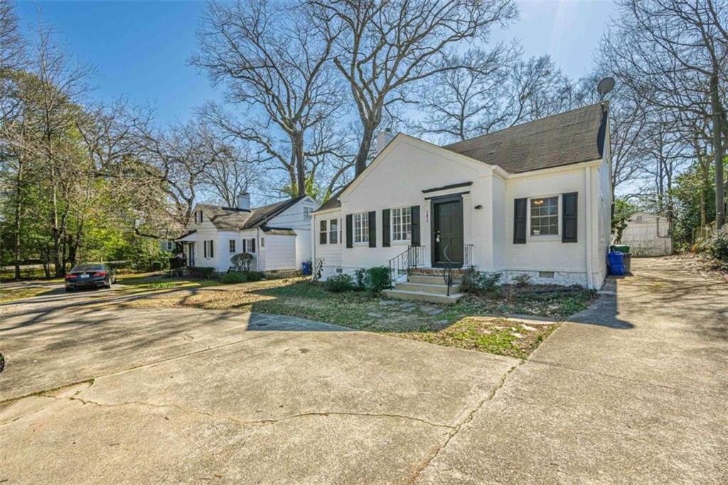 1977 North Decatur Road Atlanta, GA 30307 - Photo 4 of 59 front view of a house with a yard