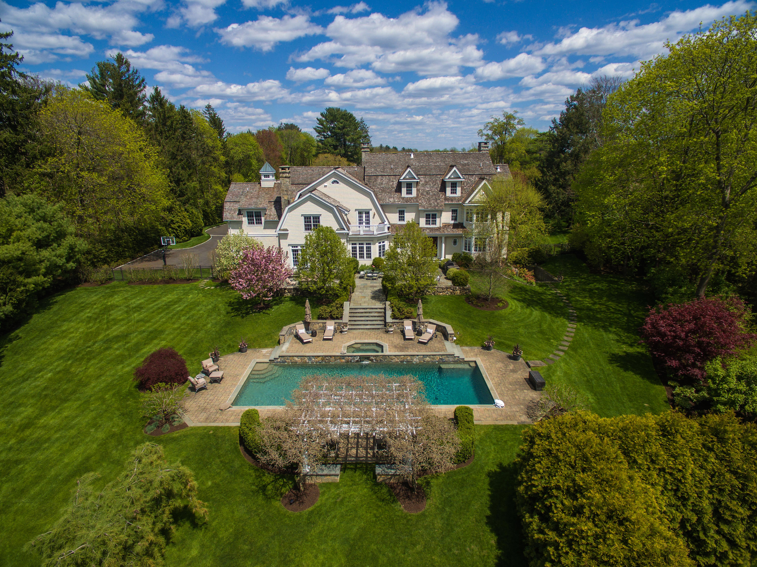 92 Rosebrook Road New Canaan, CT 06840 - Photo 3 of 44 a aerial view of a house with a garden