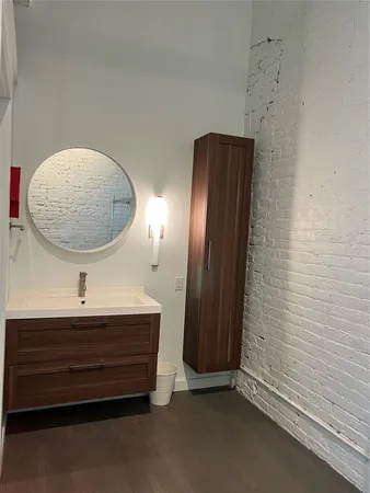 a room with a table and a mirror