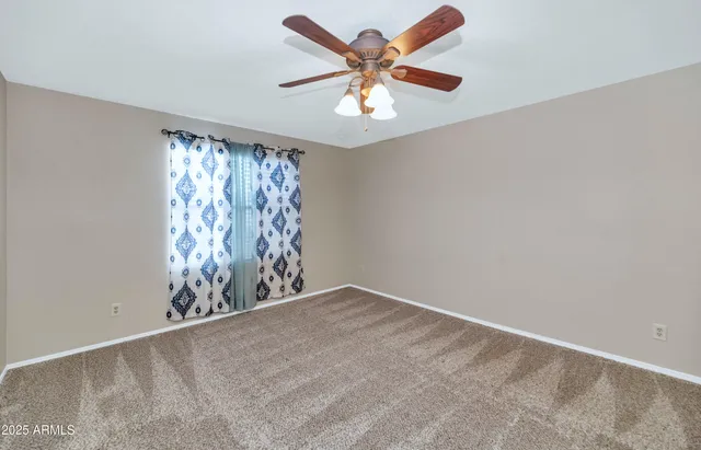 wooden floor in a hall with a window