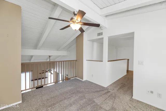 a view of a livingroom with a fan