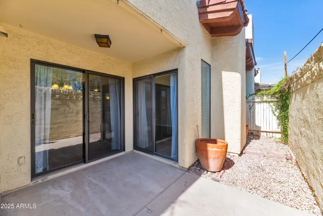 a view of a porch with a backyard