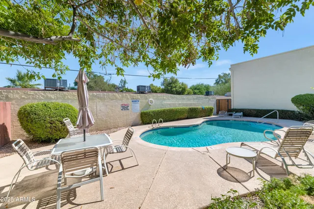 a view of backyard with seating space