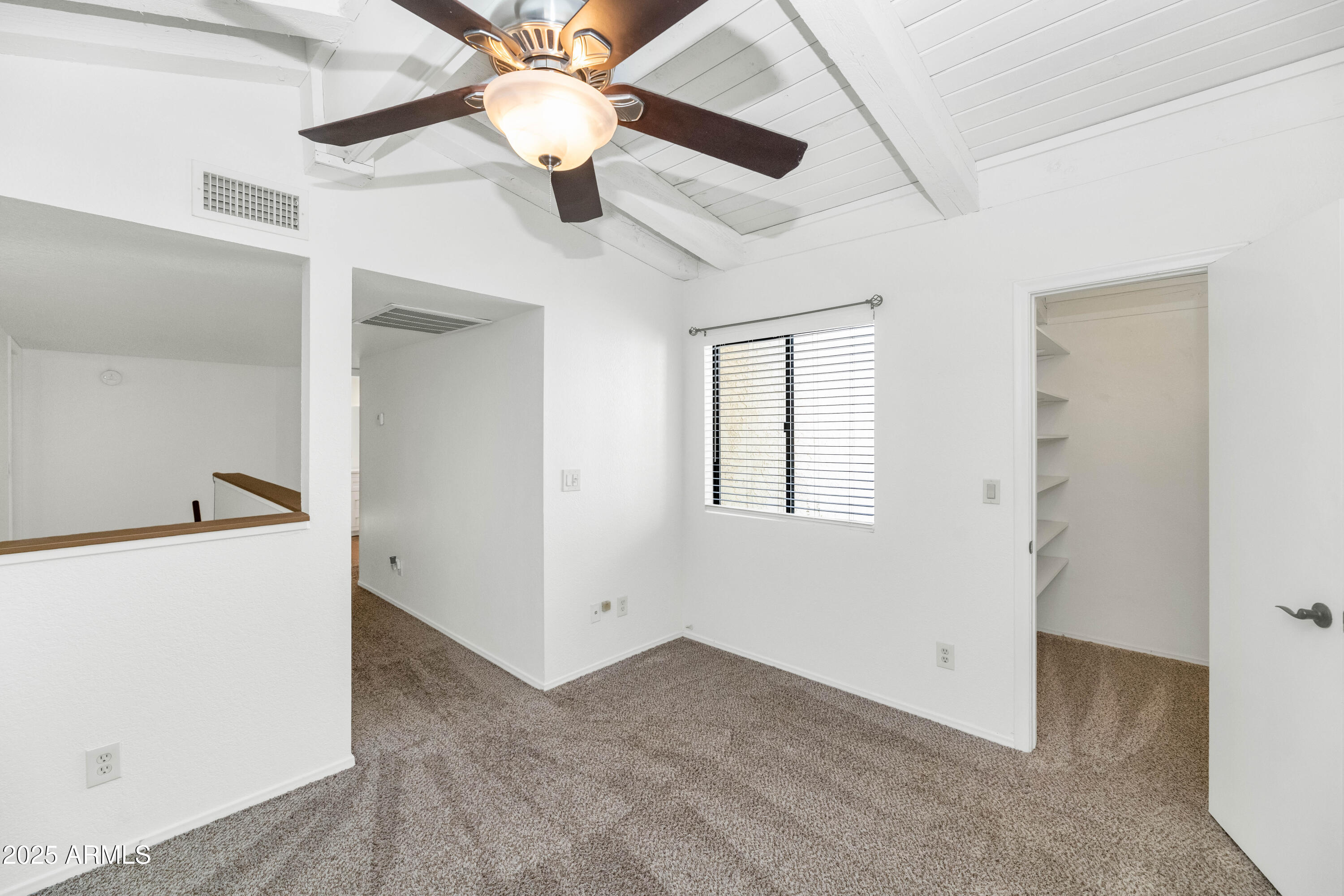 5726 North 10th Street, Unit 5 Phoenix, AZ 85014 - Photo 34 of 39 a view of a livingroom with a ceiling fan and a ceiling fan