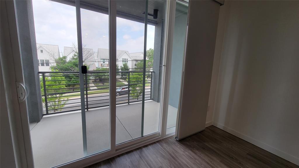 4801 Springdale Road, Unit 1202 Austin, TX 78723 - Photo 13 of 15 a view of a glass door with a window