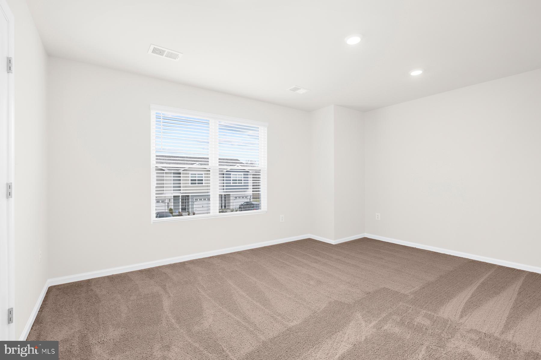 8155 Bartholomew Court Baltimore, MD 21206 - Photo 14 of 19 an empty room with a window