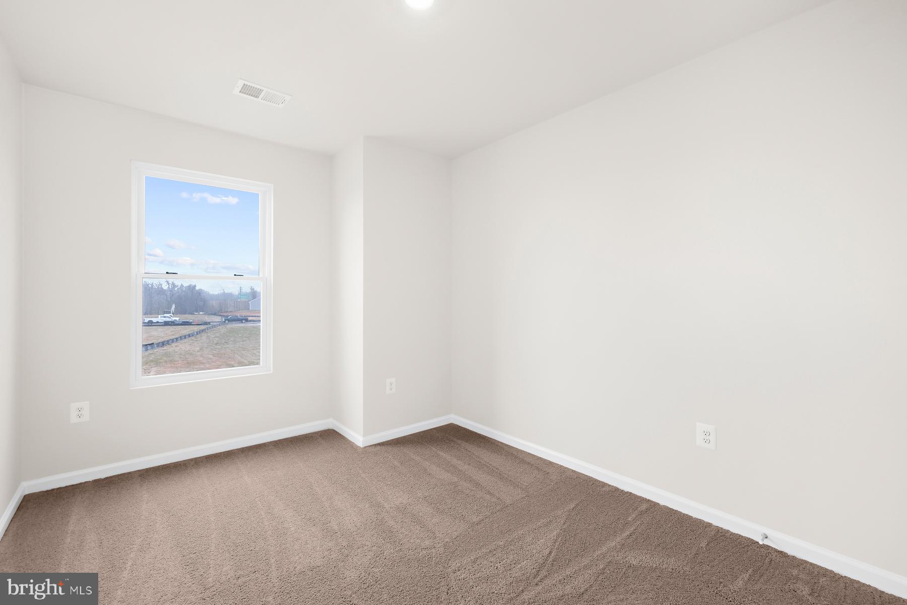 8155 Bartholomew Court Baltimore, MD 21206 - Photo 17 of 19 a view of an empty room with a window