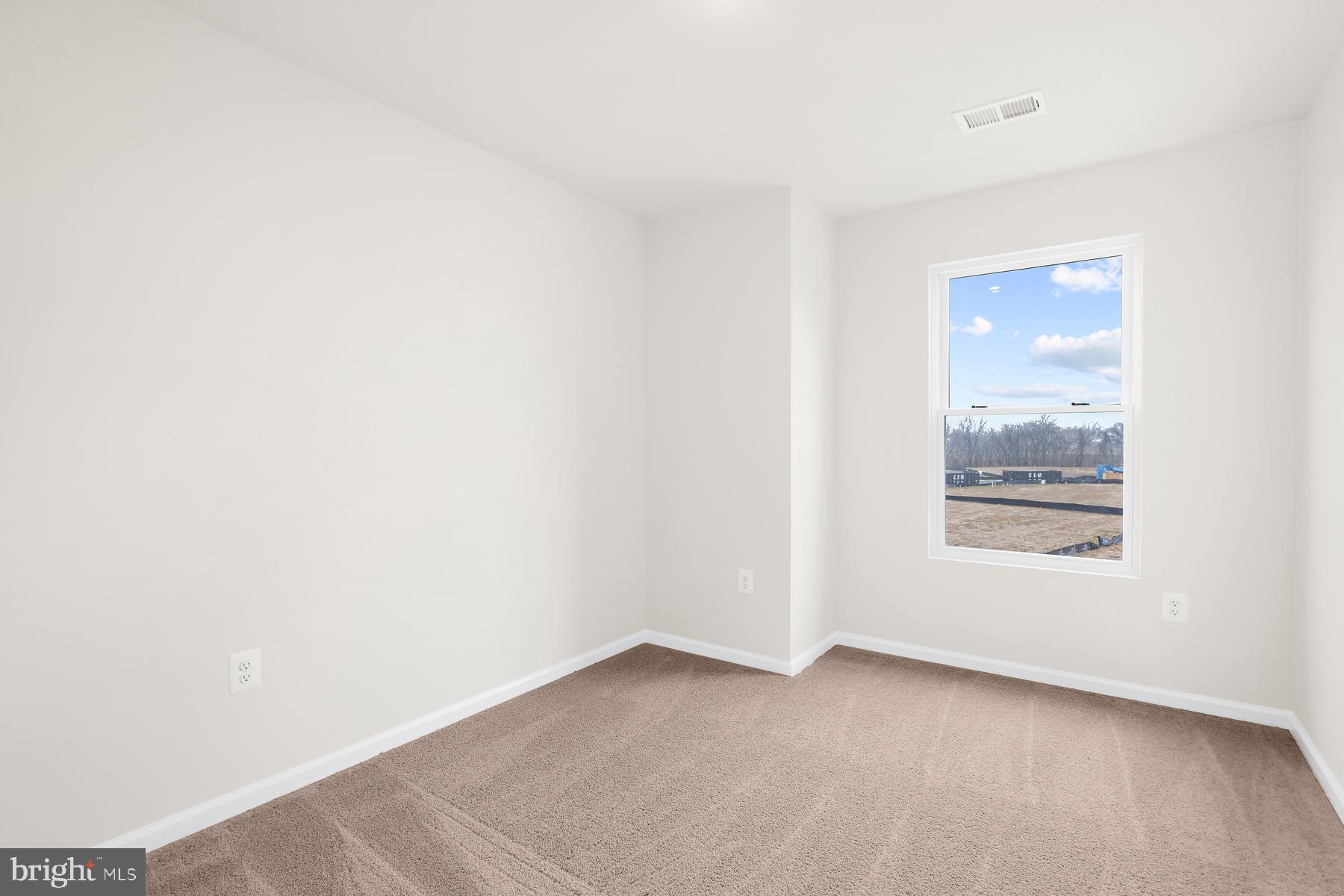 8155 Bartholomew Court Baltimore, MD 21206 - Photo 18 of 19 a view of an empty room with a window
