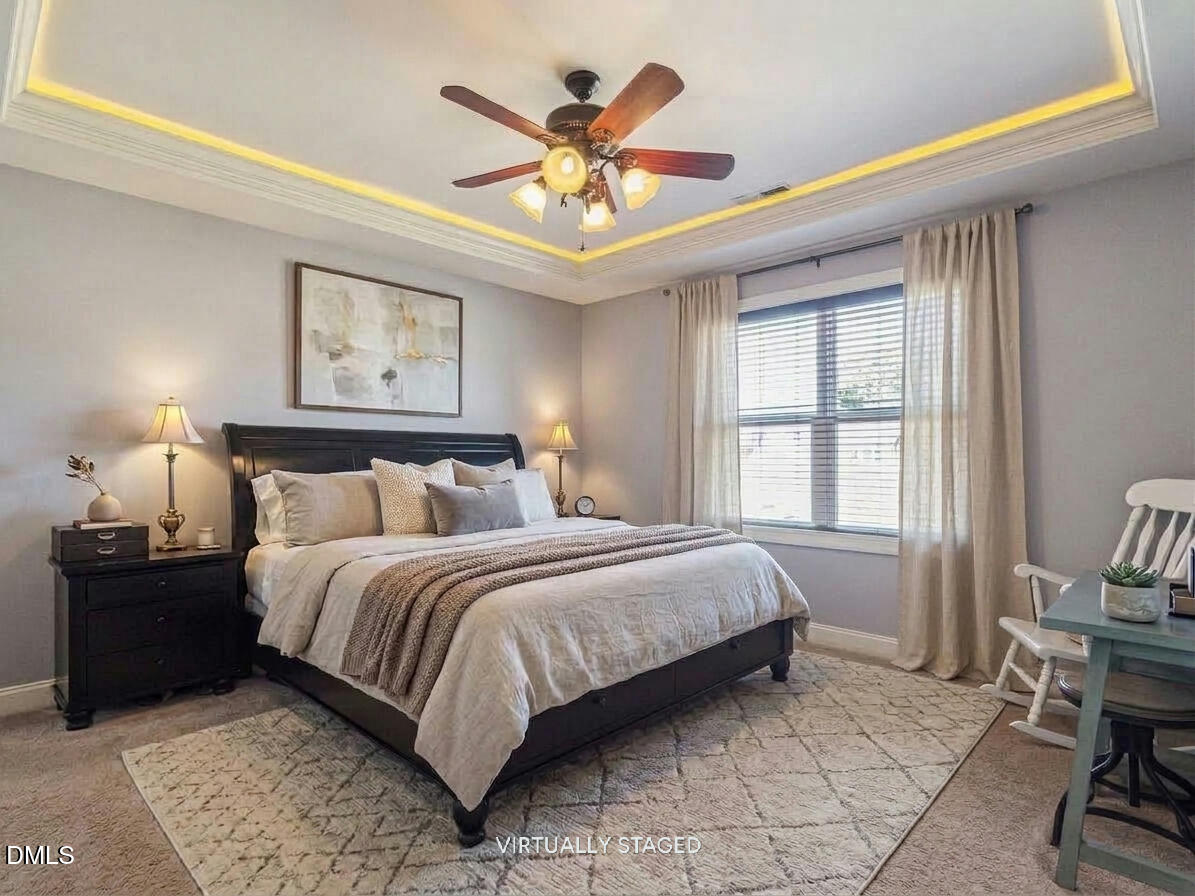 136 Kenneth Lane Willow Spring, NC 27592 - Photo 35 of 94 Virtually staged primary suite