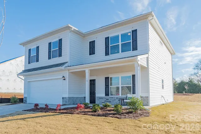 a view of house with outdoor space