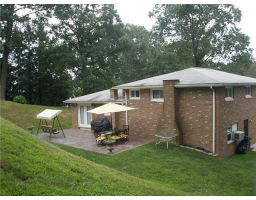 1260 Blaine Road Monaca, PA 15061 - Photo 11 of 13 Exterior Back. Brand new stamped concrete patio for outdoor entertaining