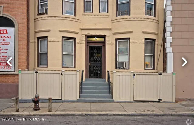 front view of a house with an empty space