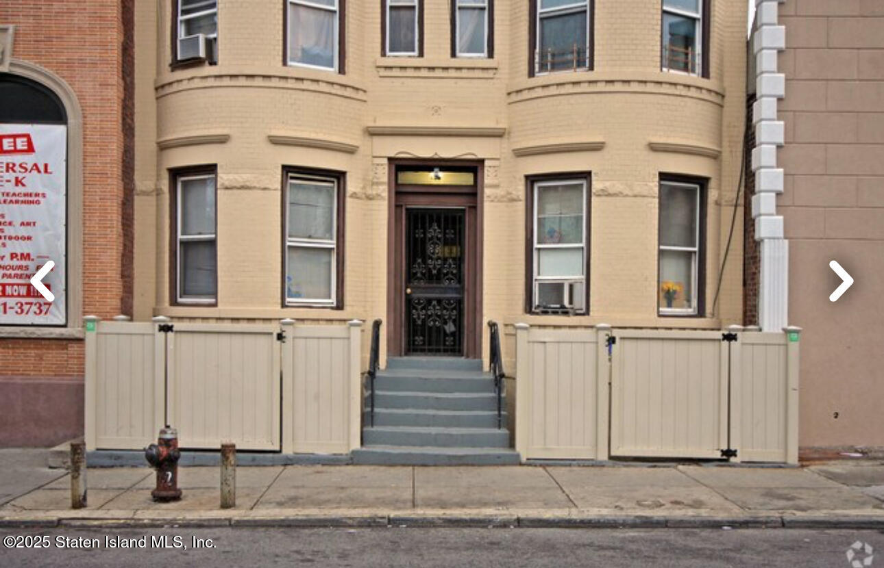 263 Bay Ridge Avenue Brooklyn, NY 11220 - Photo 2 of 3 front view of a house with an empty space